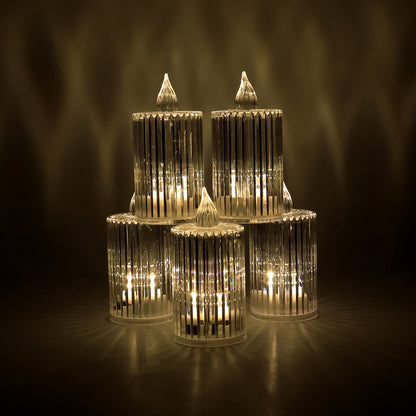 Set of five Wukusy crystal effect LED flameless candle lights for home decor, with warm glow and realistic flickering appearance.
