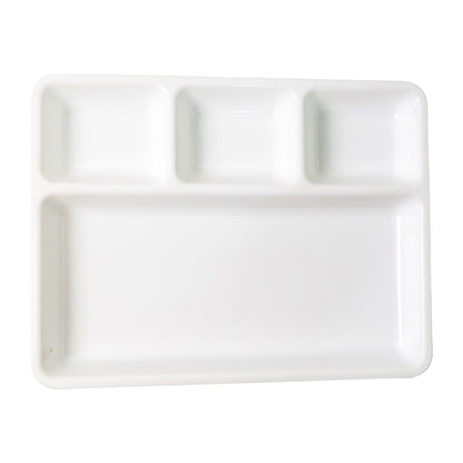 White plastic 4-compartment rectangular meal serving tray by Wukusy, ideal for home and kitchen use, featuring separate sections for meals.