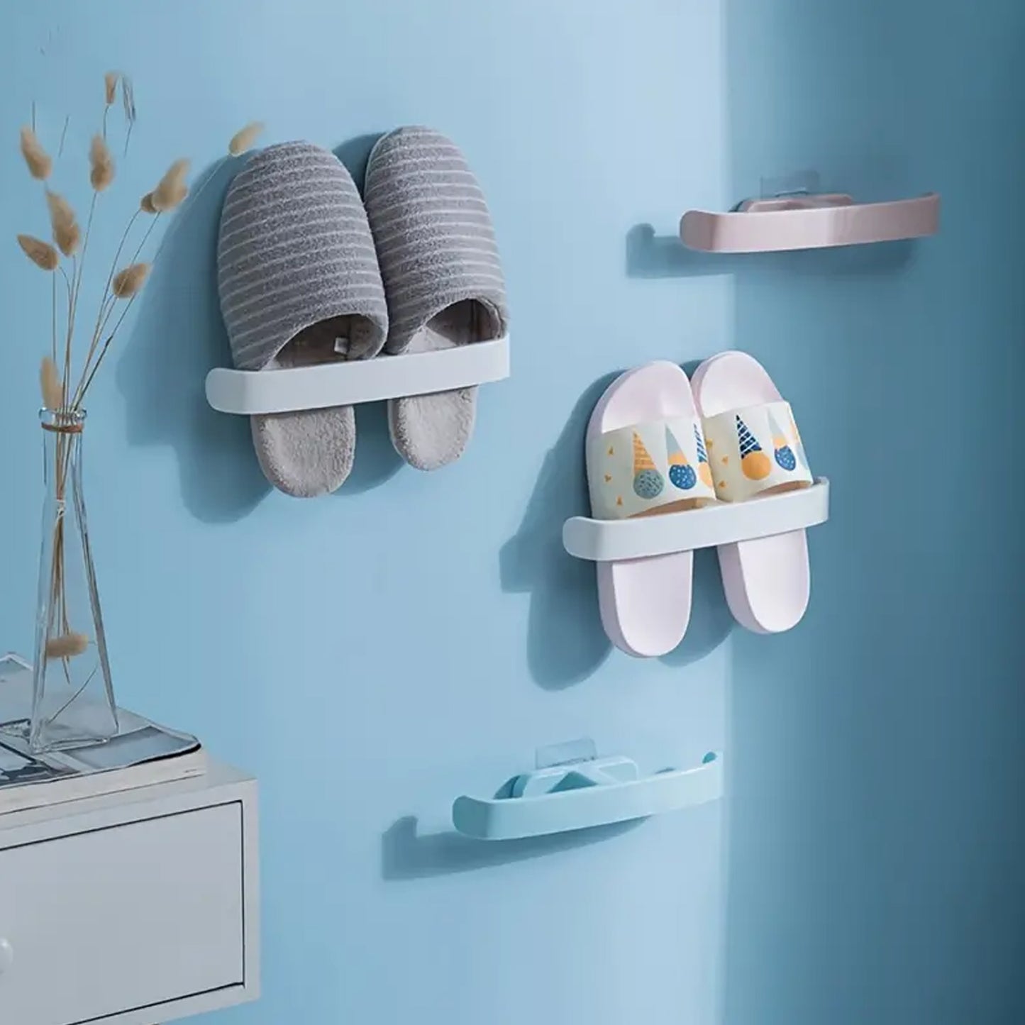 Wall-mounted self-adhesive bathroom towel and slipper hanging rack by Wukusy, ideal for organizing towels and slippers.
