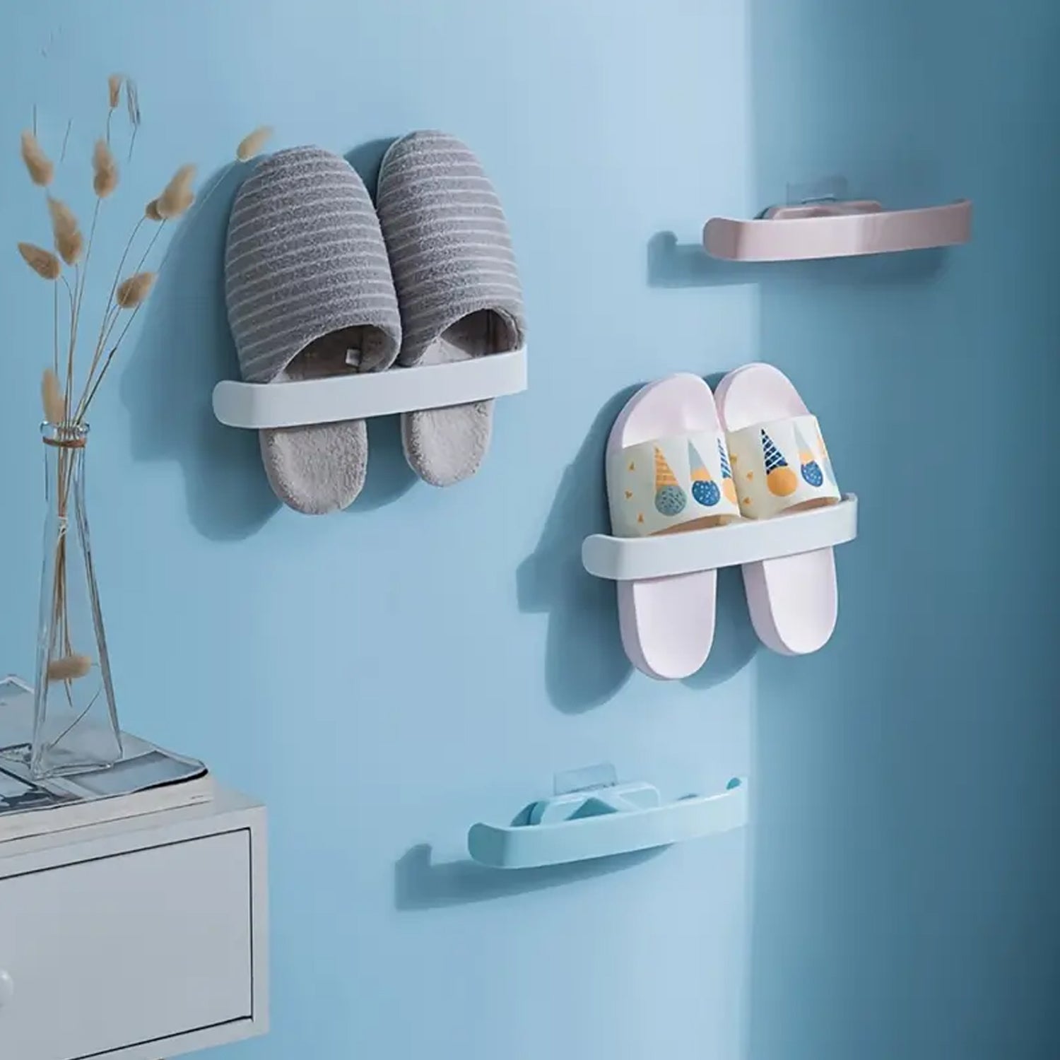 Wall-mounted self-adhesive bathroom towel and slipper hanging rack by Wukusy, ideal for organizing towels and slippers.