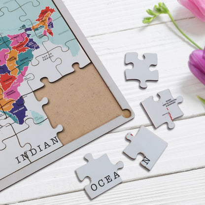 Wooden India map puzzle by Wukusy showing detailed, colorful interlocking pieces on a flat surface.
