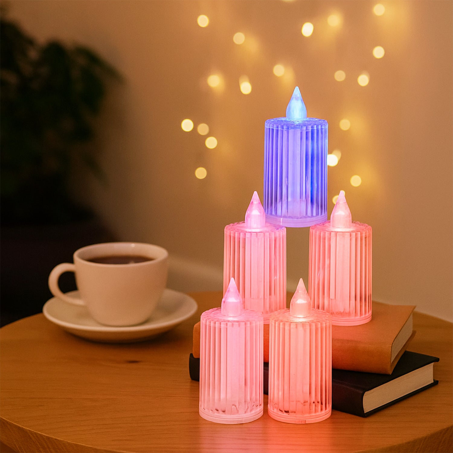 Set of six decorative flameless LED candles by Wukusy, safe electronic home decor lights with warm glow.