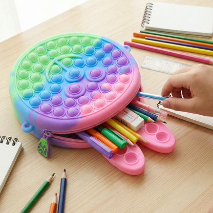 Cute caterpillar-shaped silicone pencil pouch by Wukusy, featuring pop it bubbles, ideal for school supplies and organization.