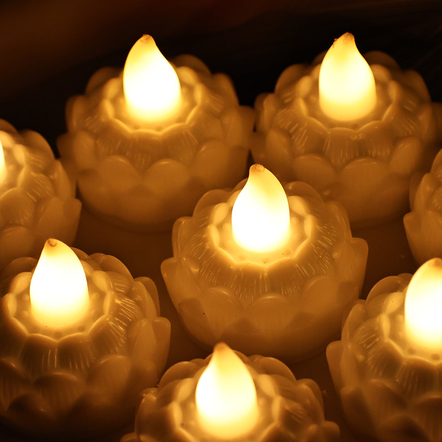 Set of 8 lotus-shaped LED flameless tealight candles from Wukusy, stylish home decor with soft glowing light.