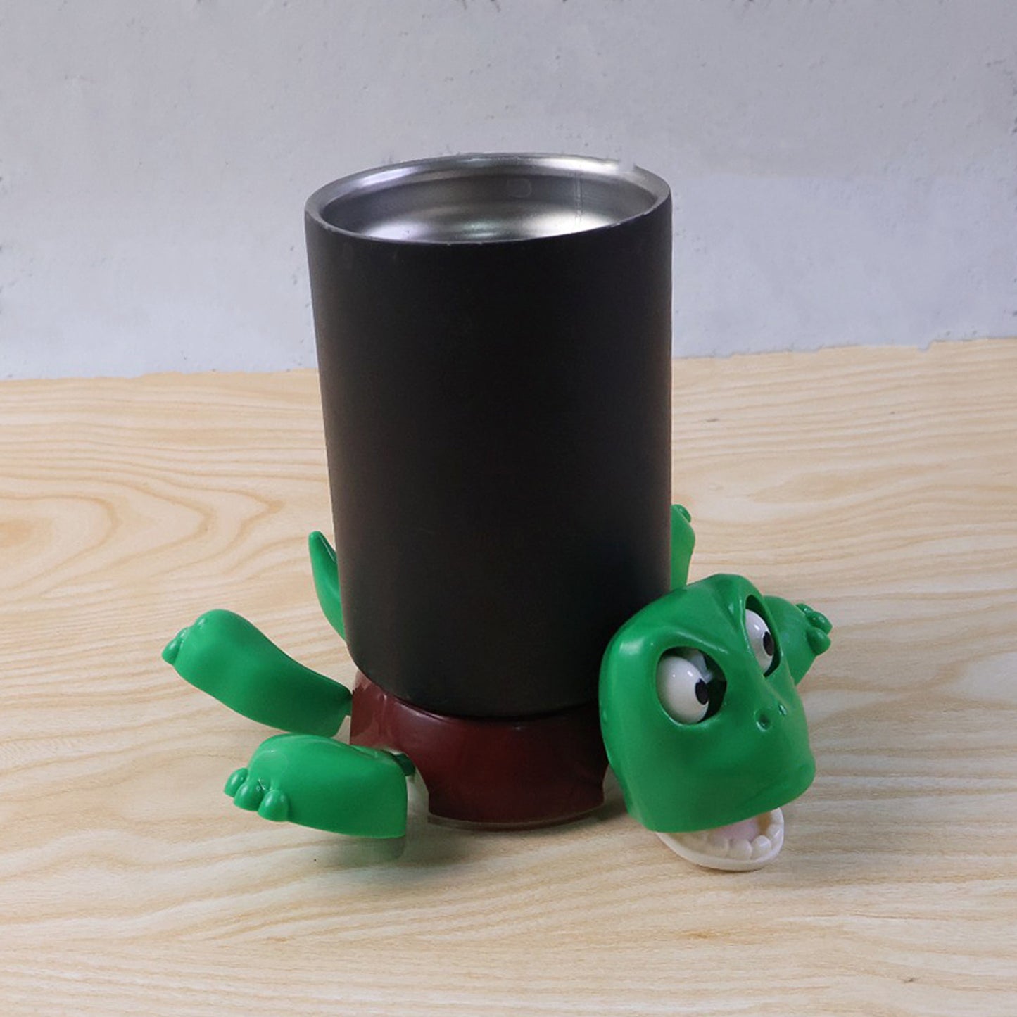 Cute plastic turtle-shaped cup coaster from Wukusy, designed for protecting surfaces in home and kitchen settings.