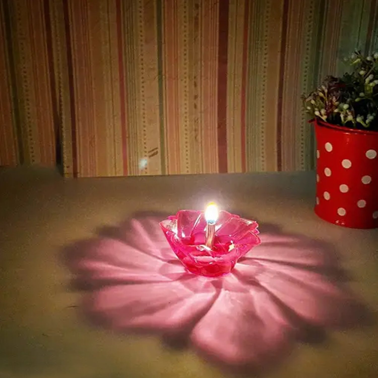 Set of 12 colorful plastic diya candles with multi-shaped cups for home decor and illumination by Wukusy.