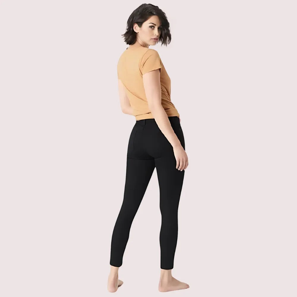 Women's black skinny fit jeans by Snazzyway featuring a sleek silhouette and close fit, shown on a model.