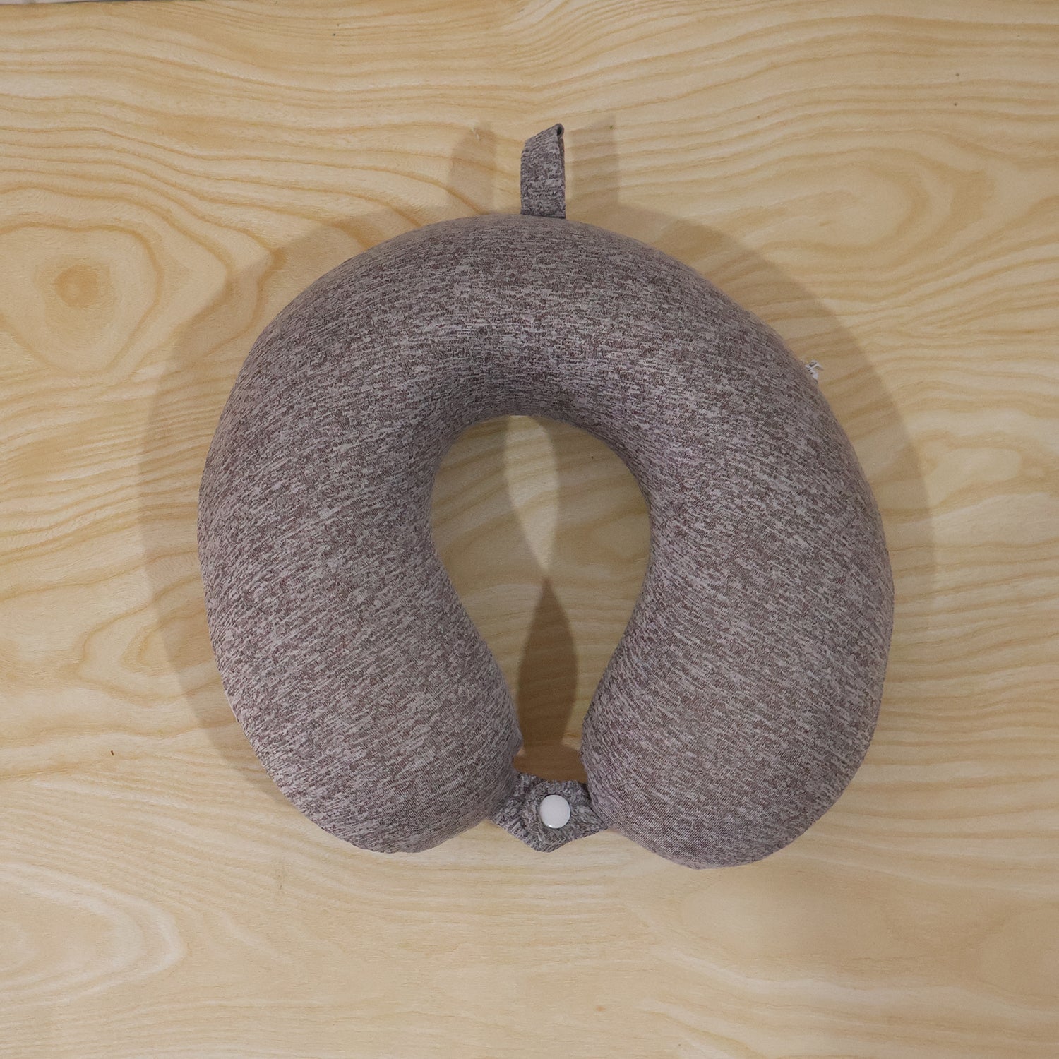 Grey melange U-shaped travel neck pillow by Wukusy with soft support for head and neck comfort.