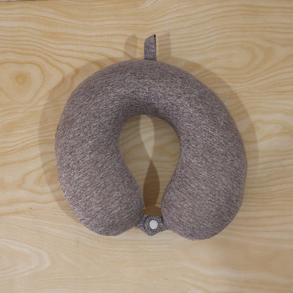 Grey melange U-shaped travel neck pillow by Wukusy with soft support for head and neck comfort.