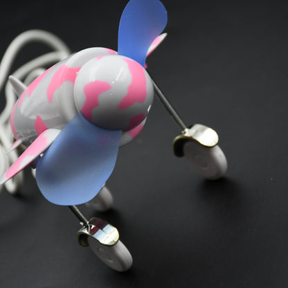Wukusy 7721 plane-shaped USB fan with unique airplane design, energy-saving portable fan for laptops and desktop computers.