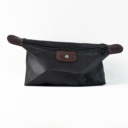 Wukusy premium travel bag organizer pouch with multiple compartments, ideal for toiletries, electronics, and accessories.