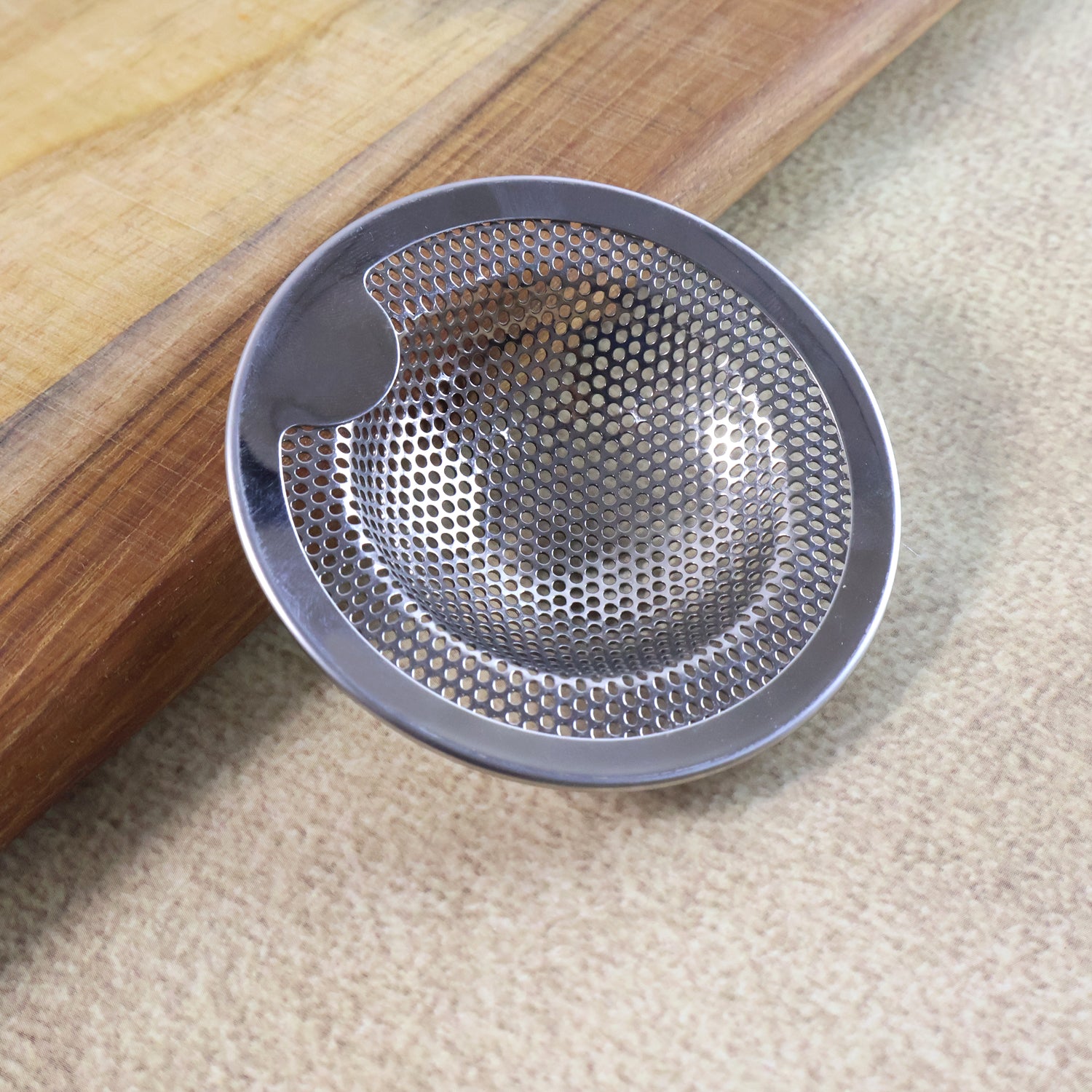 Wukusy stainless steel kitchen sink drain strainer stopper, medium size, designed to catch debris and prevent clogs in home kitchens