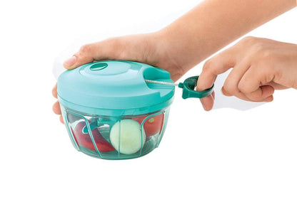 Wukusy 7008 manual stainless steel vegetable chopper with compact hand-held design and brown packaging, ideal for home kitchen use