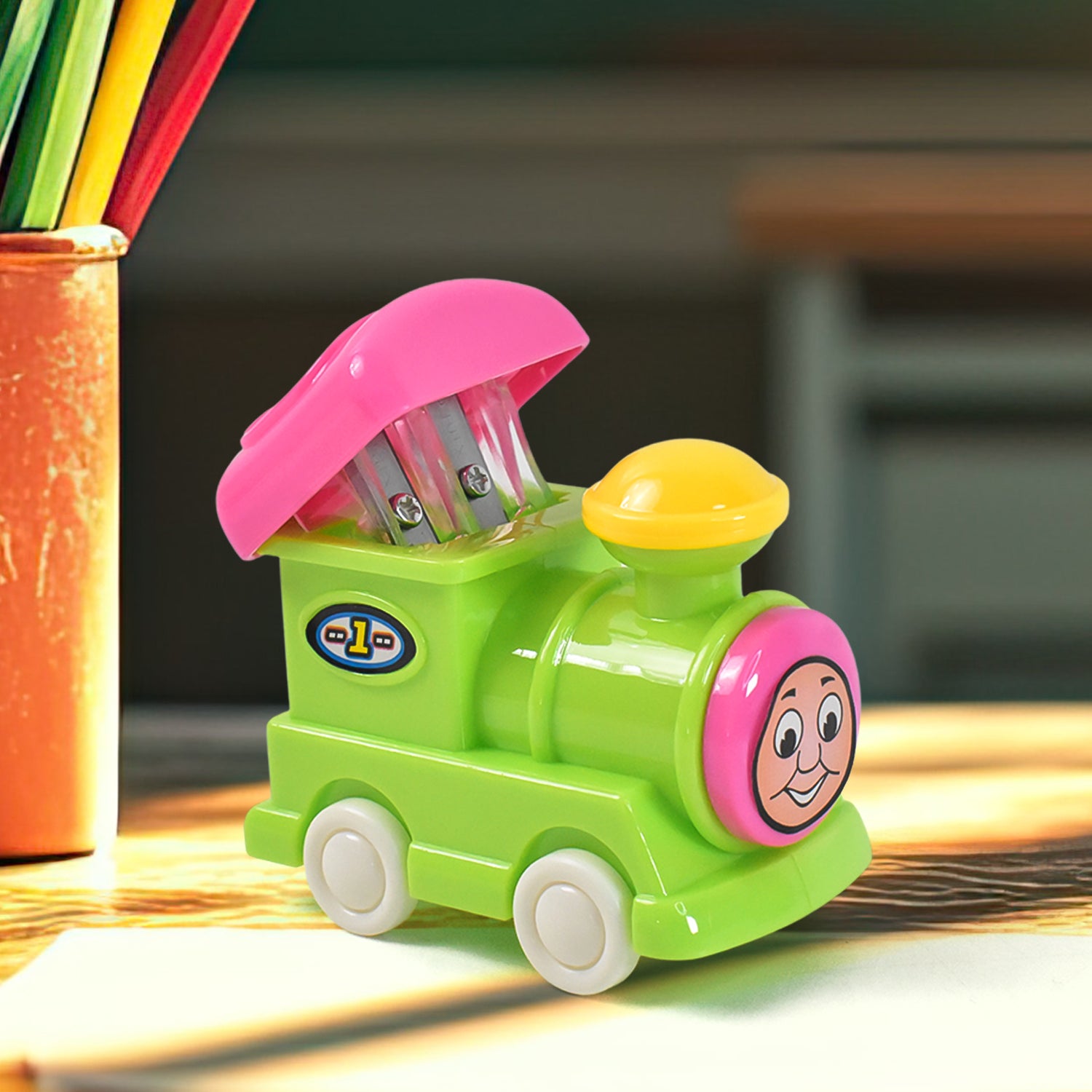 Wukusy train double hole pencil sharpener for office use, featuring two sharpening holes and a compact design.