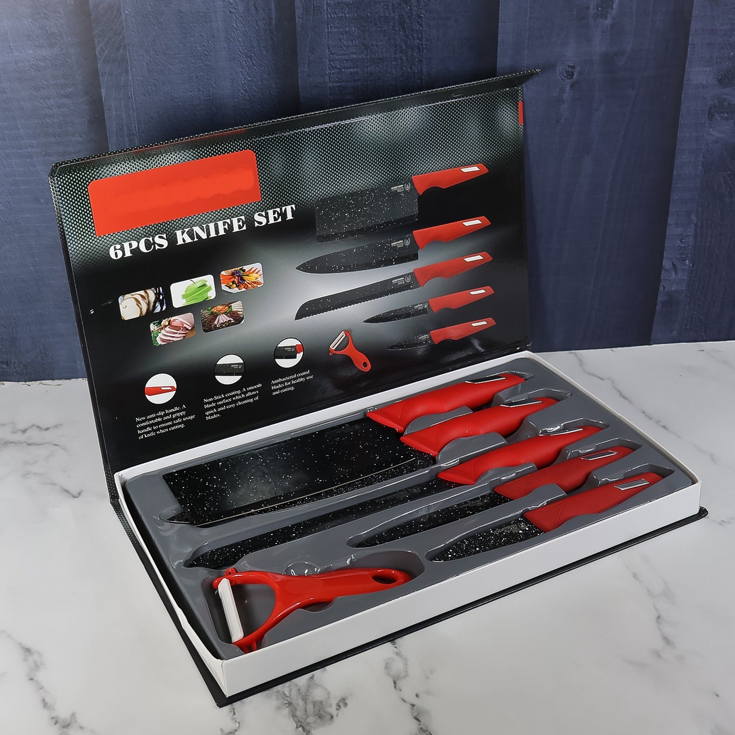 Six-piece Wukusy kitchen knife set with marble-coated blades and red handles, ideal for home cooking and food prep.