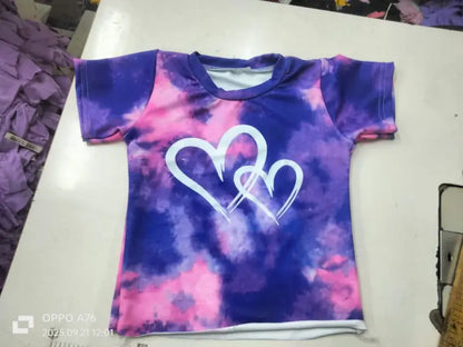Kids tie-dye heart print summer set with purple and pink T-shirt and shorts from ekom, perfect for warm weather.