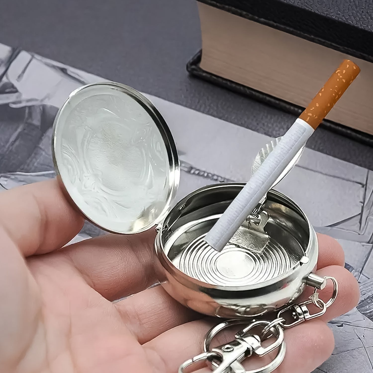 Wukusy mini pocket ashtray with keyring, compact portable design for home improvement and outdoor use, black color.