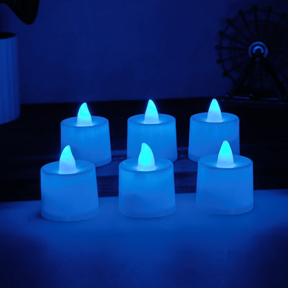 Set of six blue LED tea light candles by Wukusy, battery-operated with realistic flickering glow for ambiance.