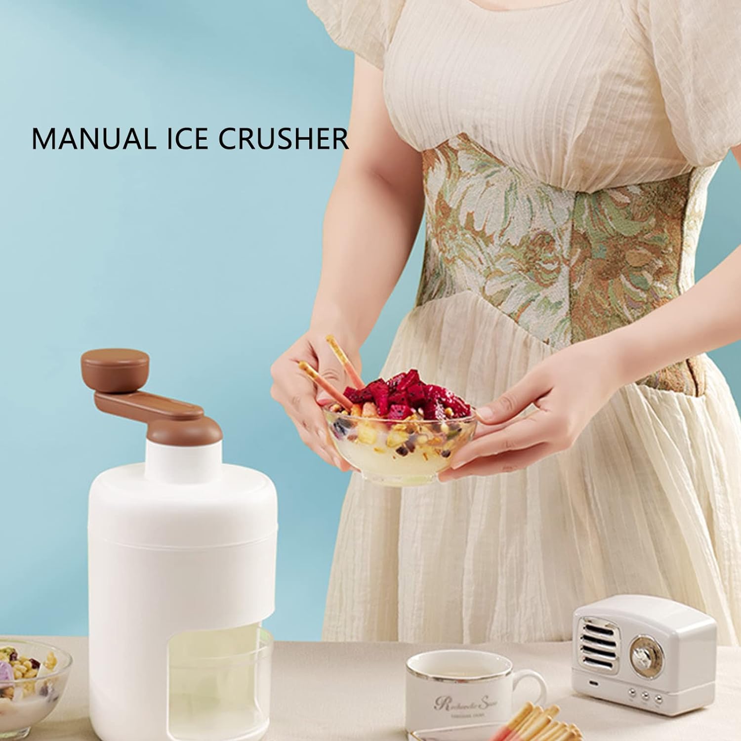 Wukusy portable ice crusher and shaved ice machine for home use, featuring manual operation and compact design for smoothies and desserts.