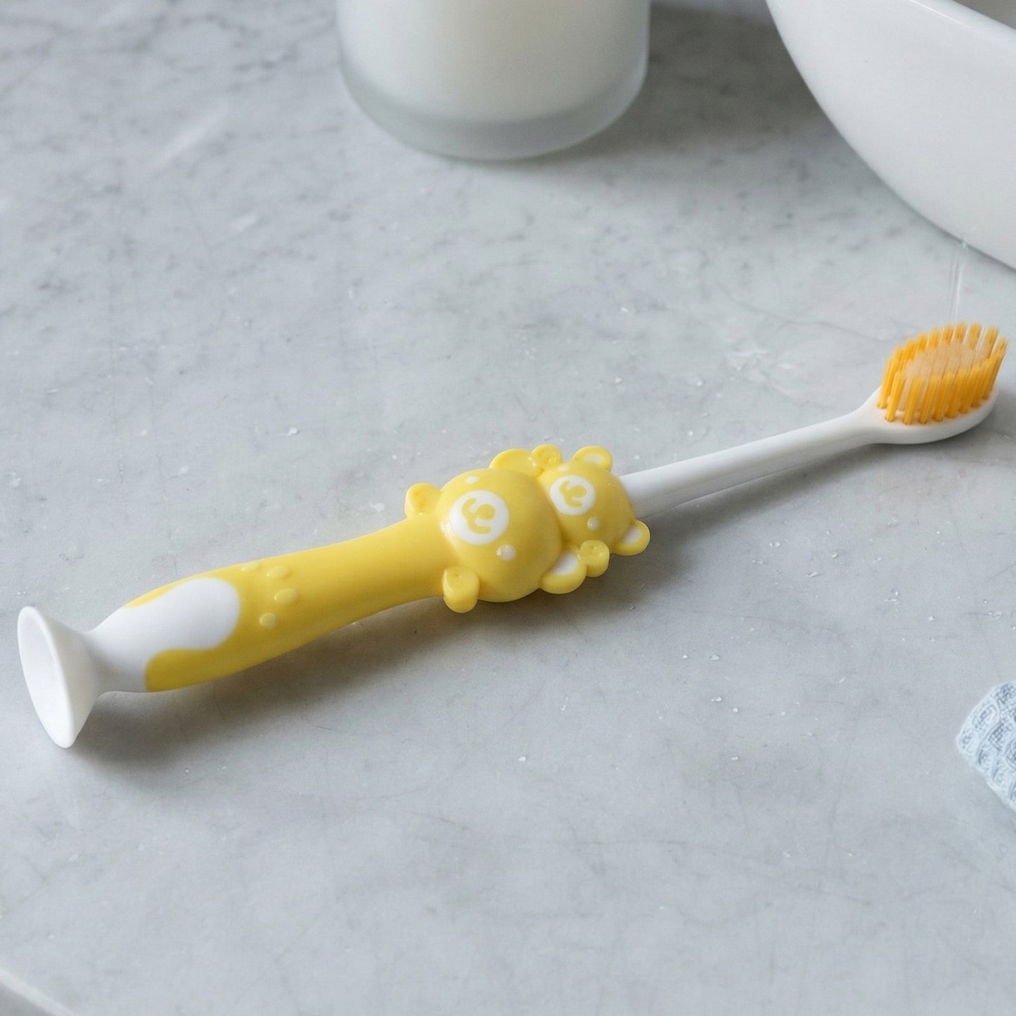 Kids cartoon design toothbrush set with musical whistles by Wukusy, featuring colorful handles and playful character details.