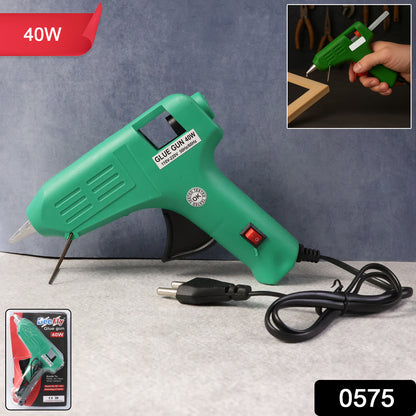 Wukusy 575 40 Watt glue gun for electronics, black handheld tool with trigger and cord, ready for precise adhesive work.