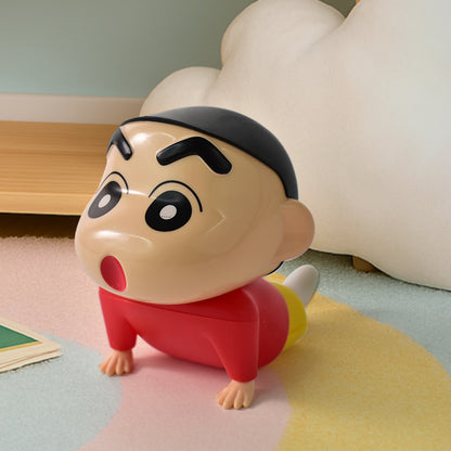 Wukusy Shinchan character sitting figurine, detailed plastic figure showcasing Shinchan's playful pose and facial expression.