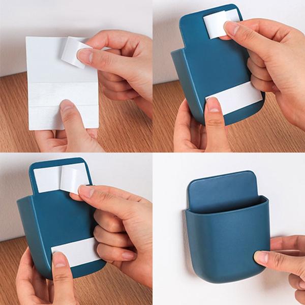 Multicolored Wukusy 1379 wall-mounted storage box for remote and mobile accessories, organized in a compact wall-mounted case.