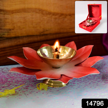 Lotus-shaped brass oil diya for home decor, featuring intricate design and a small wick holder, by Wukusy.