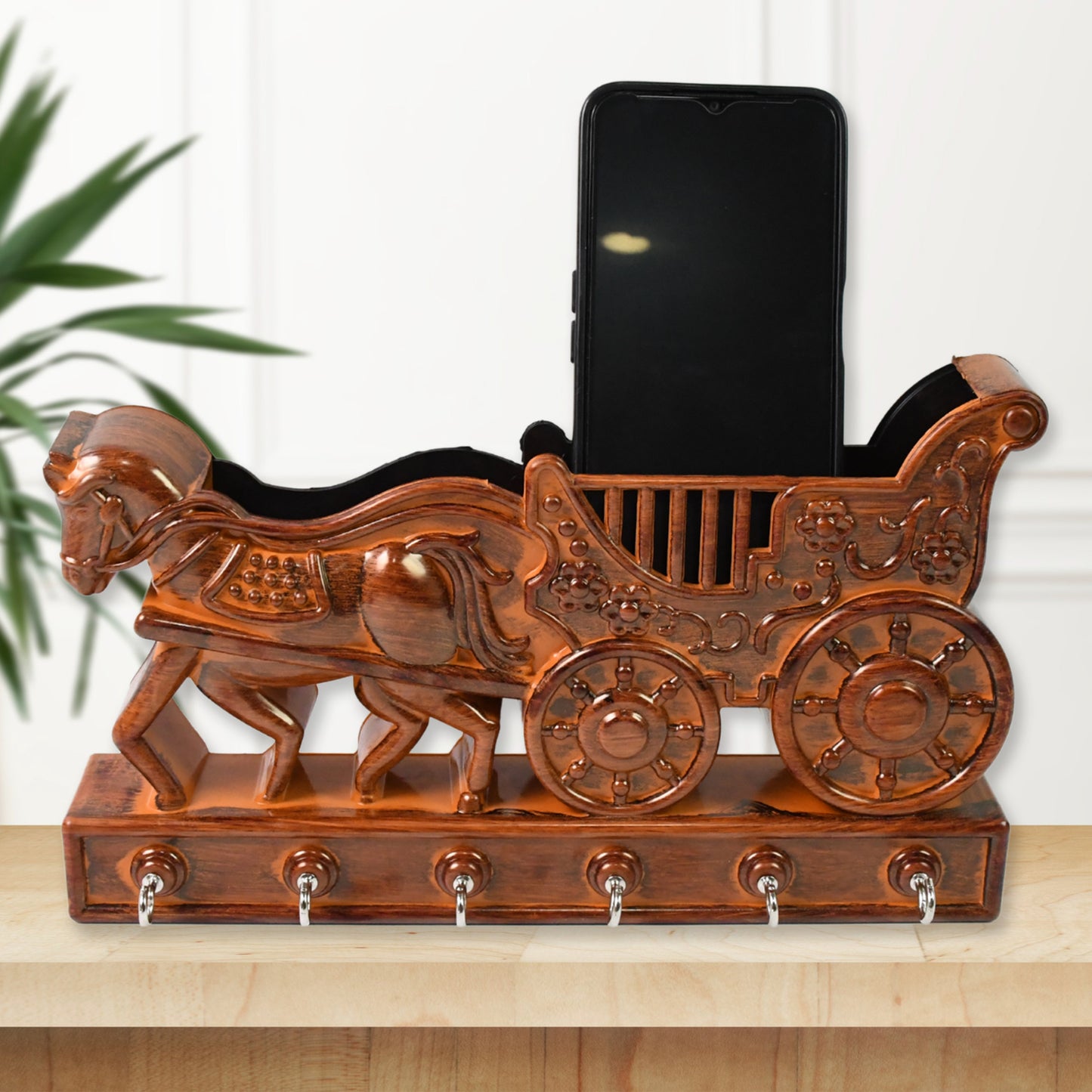 Plastic Rath Design Wukusy 6-hook key holder mounted on office wall with hooks for keys and small accessories.