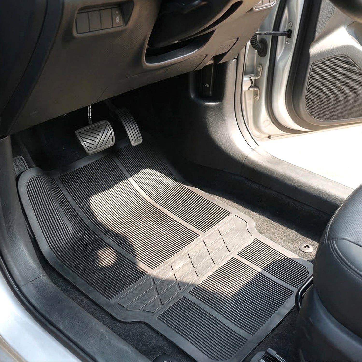 Set of four Wukusy universal car floor mats showing black rubber mats with textured surface for vehicle protection.
