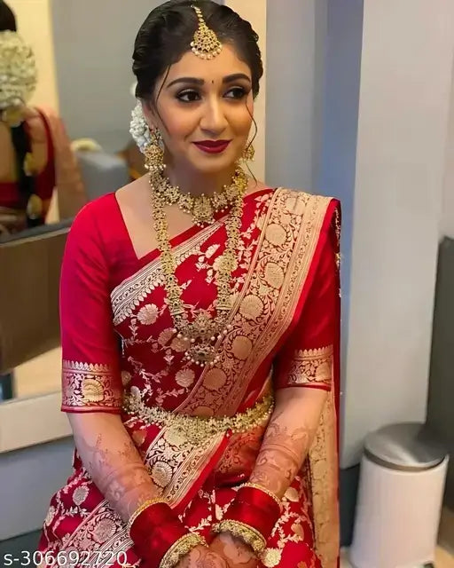 Elegant red bridal Banarasi silk saree for women from Ekom's Royal Banarasi Collection featuring intricate gold zari work.