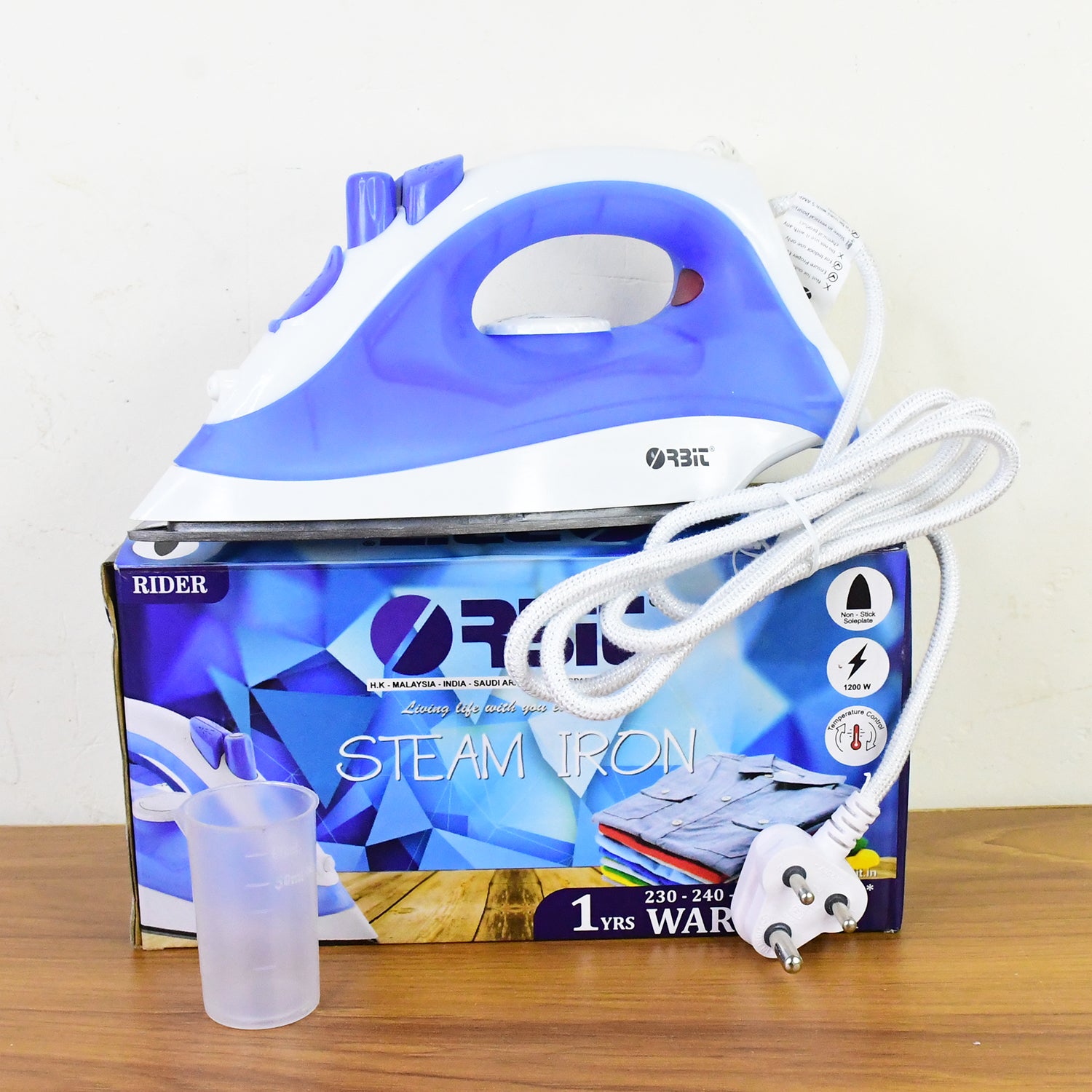 Wukusy Orbit 1200W steam iron with a sleek design, handle, steam dial, and water reservoir for efficient garment pressing.