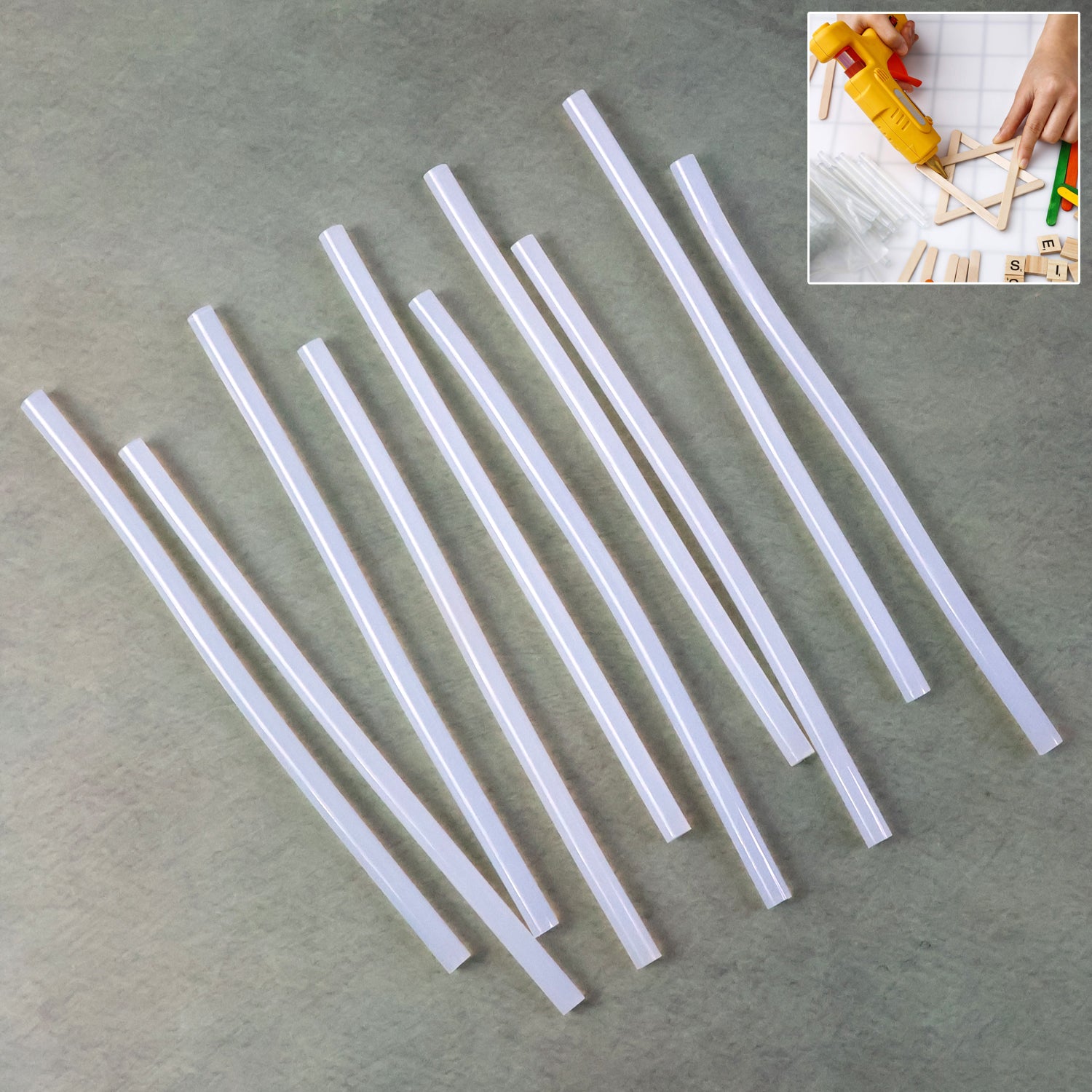 Set of 10 transparent Wukusy hot melt glue sticks for crafts and repairs, shown in a close-up image.