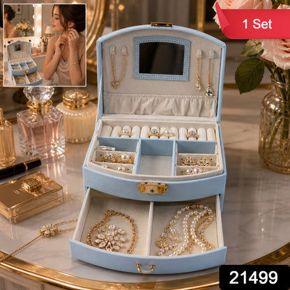 Wukusy premium multi-layer jewelry storage box with mirror, showing compartments for rings, necklaces, and earrings.