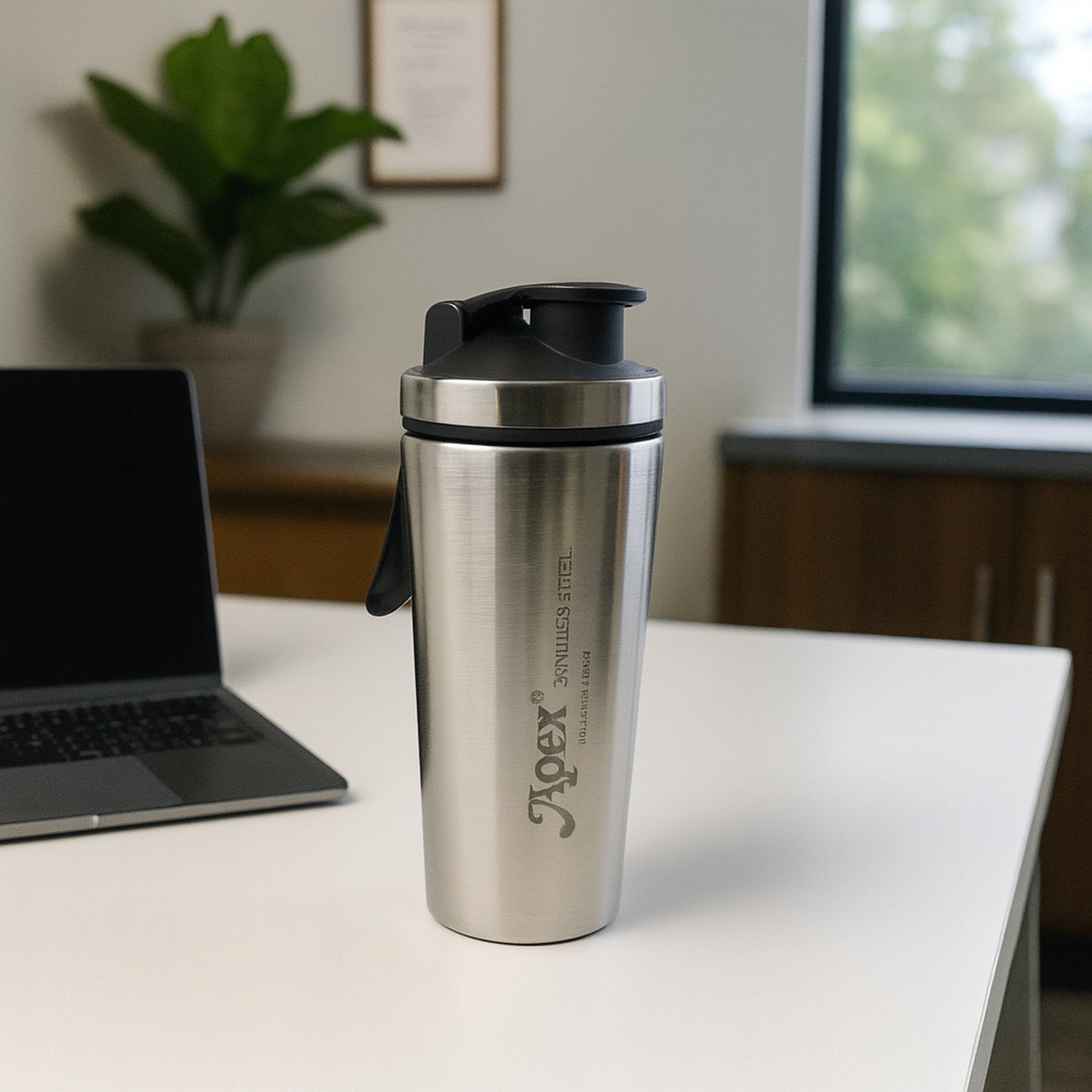 Wukusy Apex stainless steel gym shaker bottle with spring, 1000ml capacity, showing the sleek silver design and leak-proof lid.