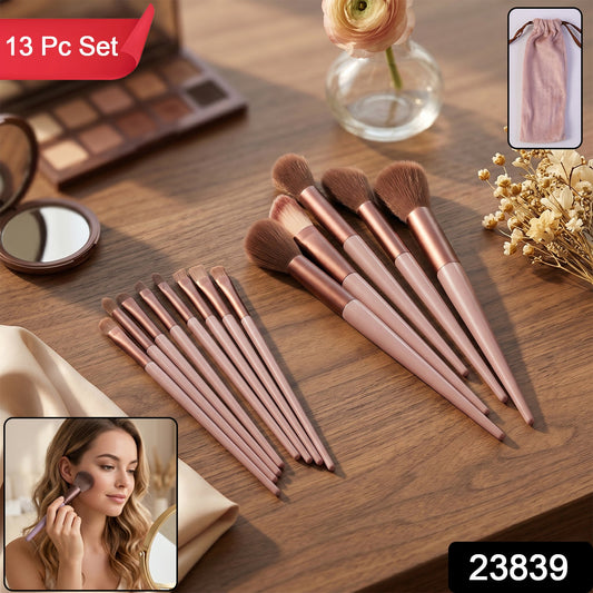 Wukusy professional 13-piece makeup brush set with soft synthetic bristles and pouch, displayed with brushes organized for makeup application.