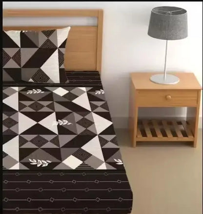 Ekom single cotton bedsheet with geometric print and pillow cover, perfect for summer use, featuring superfine fabric and comfortable design.
