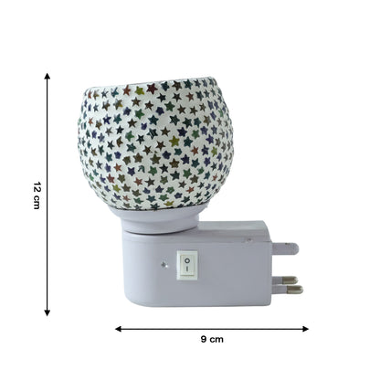 Wukusy decorative star pattern mosaic glass plug-in night lamp with glowing star design on clear mosaic glass surface