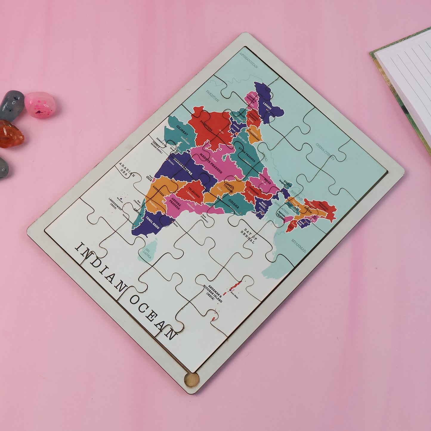 Wooden India map puzzle by Wukusy featuring interlocking wooden pieces in natural finish, educational and decorative for learning and display.