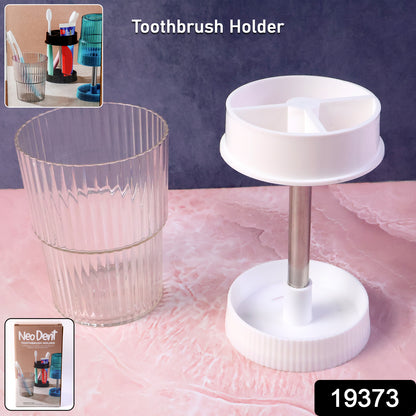 Wukusy rotating bathroom toothbrush holder stand with multiple slots for toothbrushes and toothpaste in a modern bathroom setting