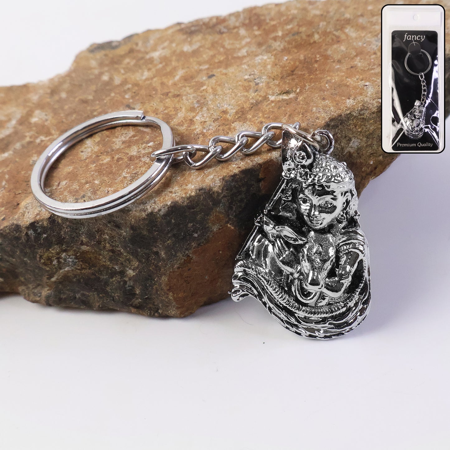 Silver-finish metal keychain by Wukusy with a sleek, polished design, featuring a sturdy keyring and modern metal craftsmanship.