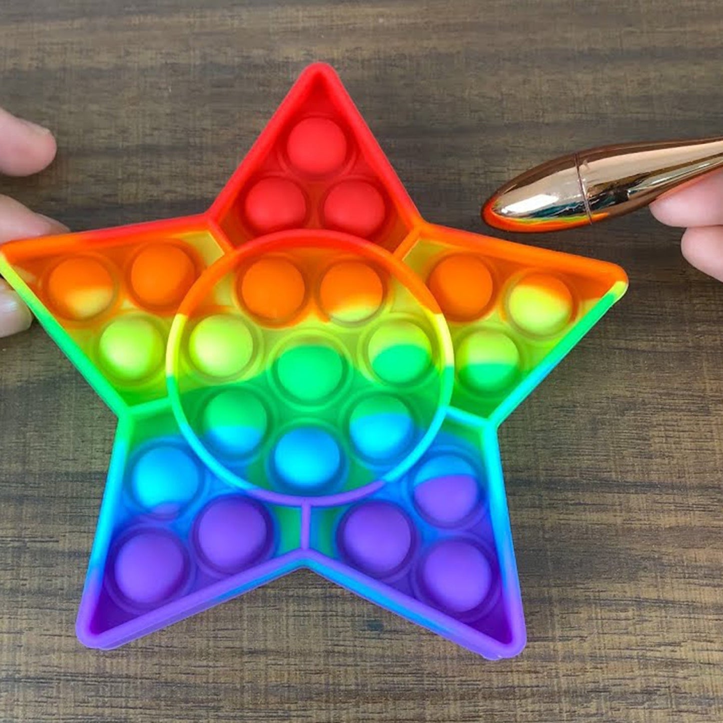 Wukusy 8067 Star Fidget Toy and Fidget Tool in vibrant colors, designed for kids to play and relieve stress.