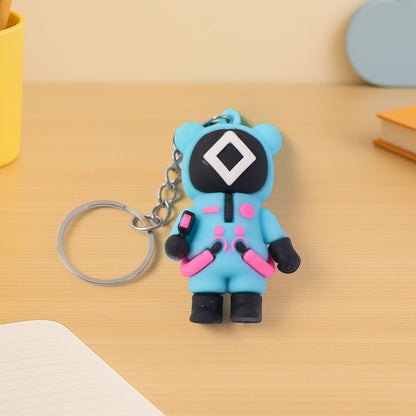 Cute character-themed soft silicone keychain featuring a playful design, perfect for attaching to keys or bags.