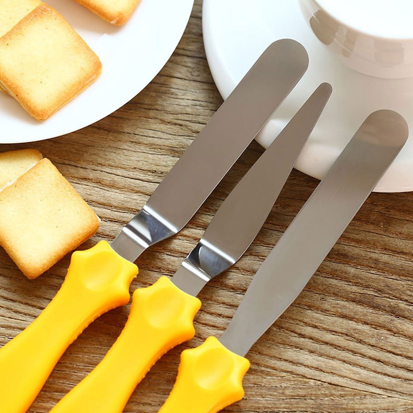 Wukusy 2805 multi-function stainless steel cake icing spatula set with flat, angular, and triangle pallet knives for precise decorating.
