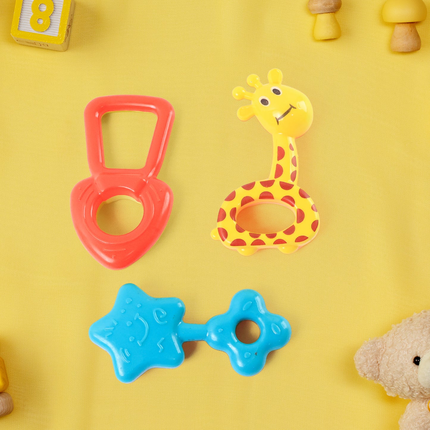 Set of five colorful plastic baby rattle toys by Wukusy, designed for infants to grasp and shake.