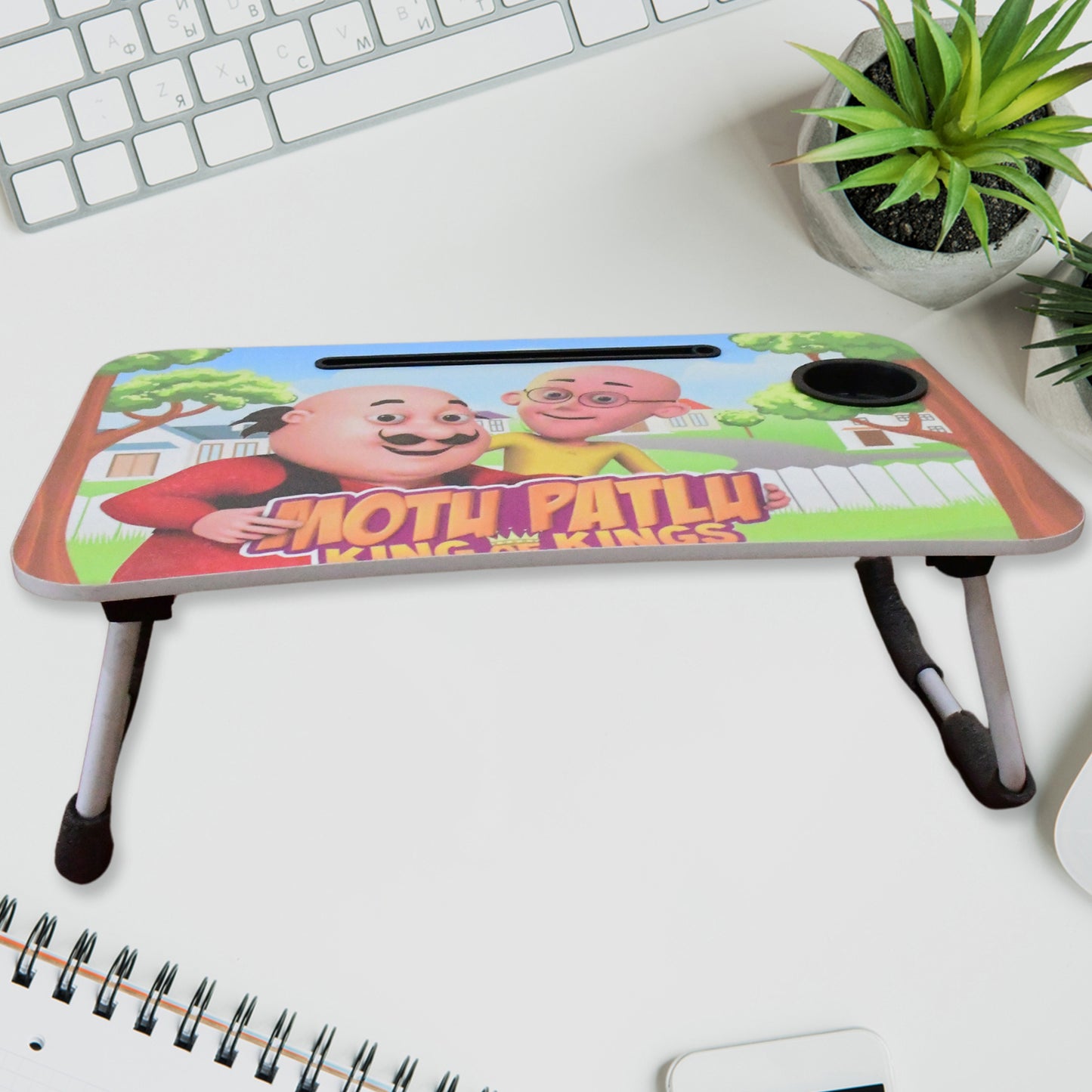 Wukusy portable office table with colorful cartoon design, suitable for writing and homework, featuring a mix of fun printed patterns.