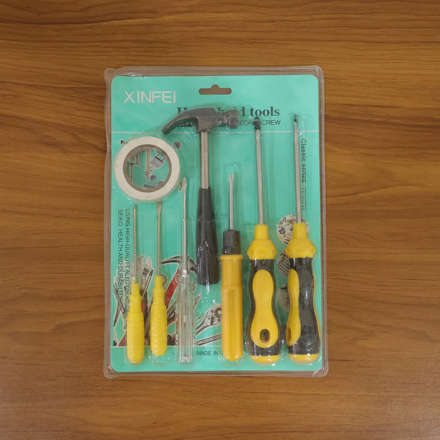 Wukusy 8-in-1 hand tool kit set includes screwdrivers, hammer, and repair tools in mixed colors, compact and versatile for repairs.