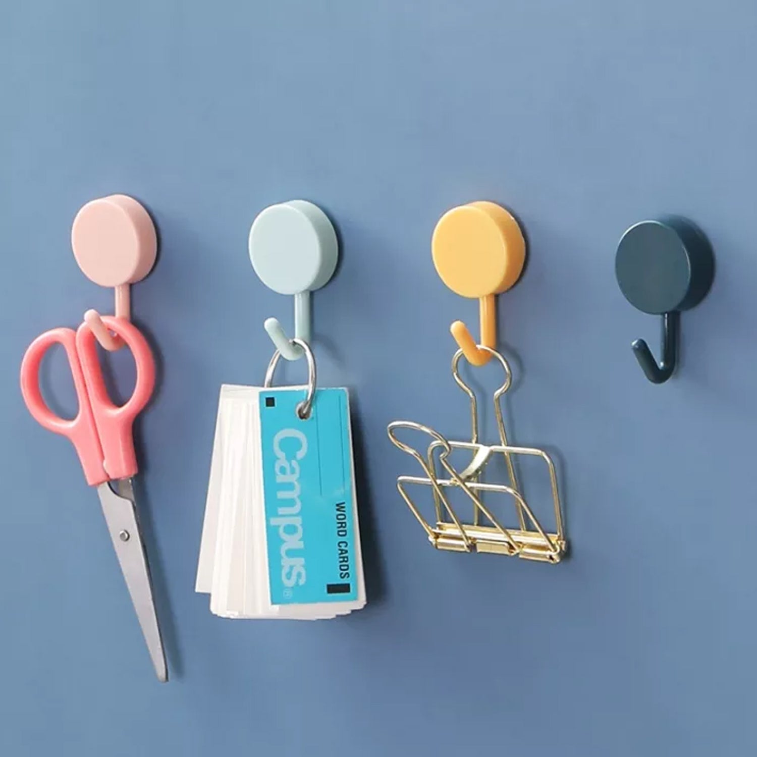 Two large heavy-duty wall hooks by Wukusy, designed for home use, mounted on a wall for hanging items.