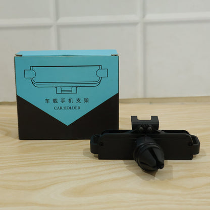 Wukusy plastic car mobile phone holder with air vent mount, 360-degree rotation, securely attached to vehicle air vent.