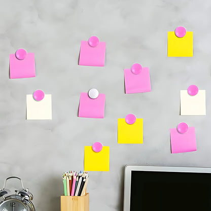 Pink circular plastic board magnets by Wukusy, perfect for office use, shown holding papers on a magnetic surface.